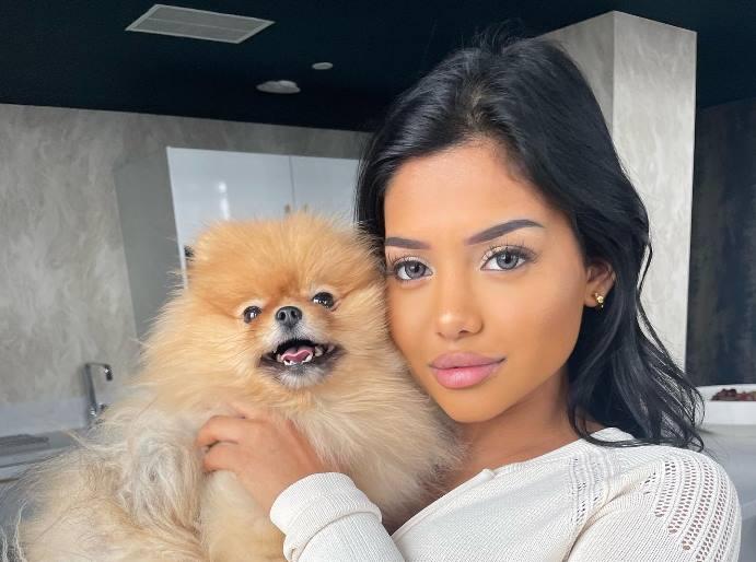 Nurshath Dulal with her Pet Dog Simba